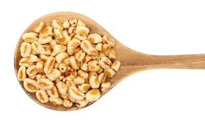 Puffed wheat cereal flakes with honey in wooden spoon isolated on white, top view