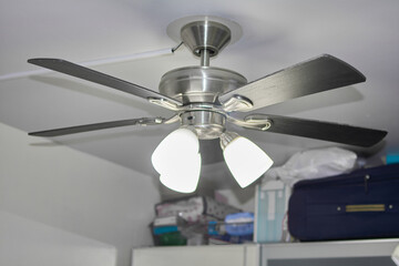 Naklejka na ściany i meble Climatic comfort at home through a fan