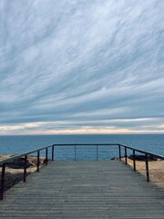 Fototapeta na wymiar Ocean coast, cloudy sky, cloudy weather at the ocean