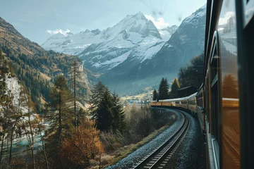 Tuinposter A scenic train journey through the Swiss Alps with snow © Daniel