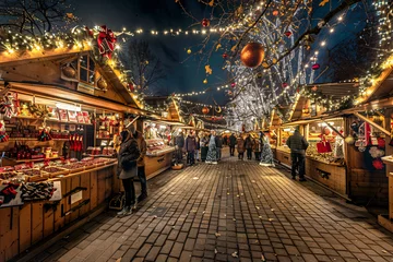 Fototapeten A panoramic view of a Christmas market filled  © Daniel