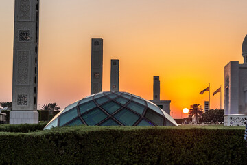 Sunset at the grounds of Sheikh Zayed Grand Mosque in Abu Dhabi, United Arab Emirates. - 762745992