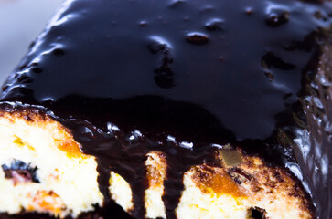 Curd cheesecake in chocolate on a plate