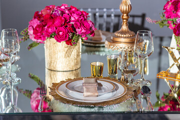 Elegant event table setting gold white magenta red