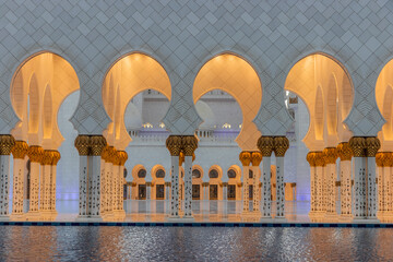 Colonnades of Sheikh Zayed Grand Mosque in Abu Dhabi, United Arab Emirates.