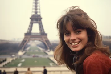 Rolgordijnen Young caucasian woman smiling at Eiffel Tower in Paris in 1970s © blvdone