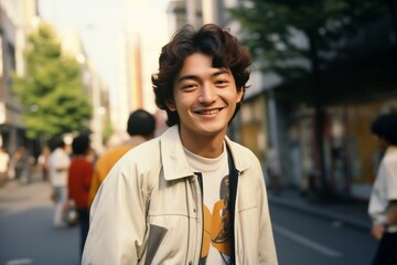 Young Asian man smiling happy in 1970s