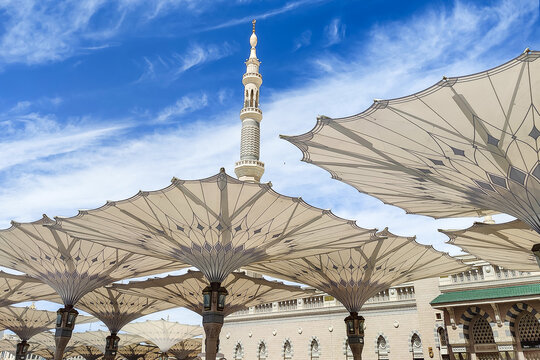 Courtyard of the Al Haram or Al-Masjid an-Nabawi mosque in Medina Saudi Arabia on a sunny day. It was the second mosque built by Muhammad in Medina and is now one of the largest mosques in the world.