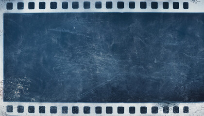 Distressed overlay. Dust scratches filter. Smeared dirt stains on dark blue weathered surface. Distressed chalkboard texture design. old-fashioned film edited by televisions