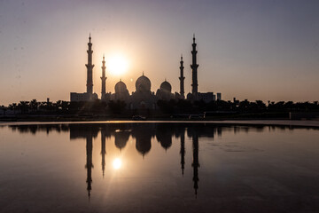Fototapeta na wymiar Reflection of Sheikh Zayed Grand Mosque in Abu Dhabi, United Arab Emirates.