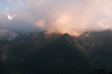 Sunset and mist in the mountains (Dôme du Goûter, Mont Blanc, Chamonix) - obrazy, fototapety, plakaty