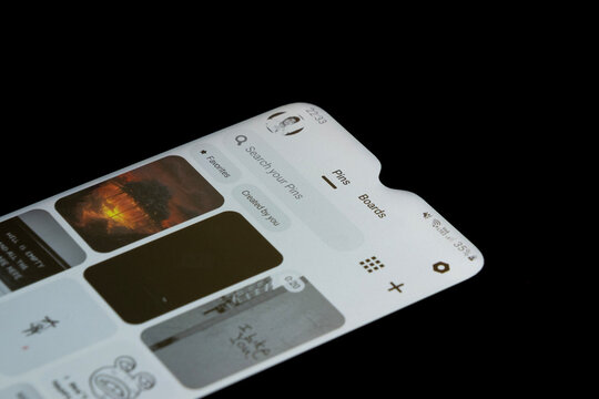 Pinterest pins screen on Android phone, using Pinterest app, smartphone screen with black background, profile page: Istanbul, Turkey - 12.03.24