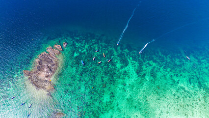 Blacktip Reef Shark Point, Phi Phi island, Krabi, Thailand. Boats arriving to the popular...