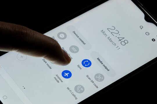 Turning airplane mode on Android phone, Samsung phone page screen, smartphone screen with black background, turn on airplane mode, don't disturb concept: Istanbul, Turkey - 12.03.24