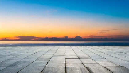 Fototapeta na wymiar empty concrete floor against the backdrop of the ocean at sunset