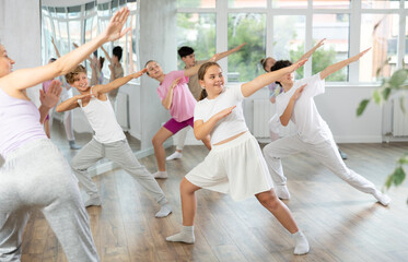Obraz premium Group of children boys and girls dance hip hop in studio