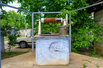 Well with drinking water. Background with selective focus and copy space