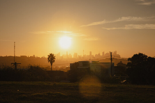 sunset over the city skyline of sydney, australia