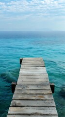Scenic wooden pier extending over ocean