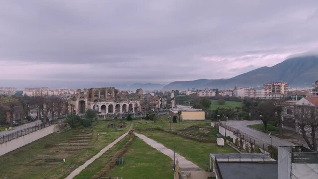 Aerial approach to the Roman amphitheater in the city of Santa Maria Capua Vetere