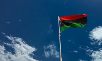 Juneteenth 19 nineteen day flag blue sky background wallpaper copy space cloudy slavery equality...