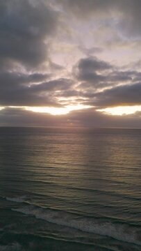 Beautiful sunset over the atlantic ocean on a cloudy day