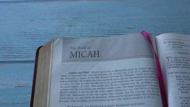 Panning view on the book of Micah of old testament, Holy Bible.