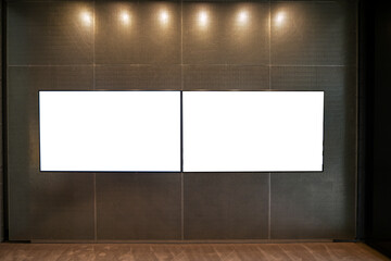 Sophisticated dual horizontal blank billboards in a modern interior: A mockup template featuring two empty white digital screens mounted on a wall, for showcasing information or media in an urban room