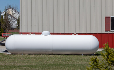 Large propane or liquid gas tank.