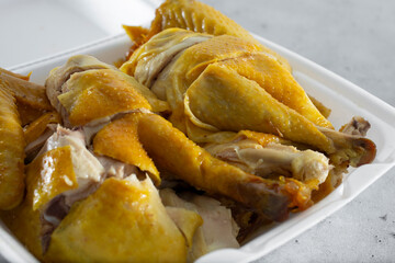 A view of a chopped whole chicken.