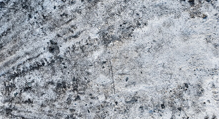 Textured gray concrete surface with space for text, suitable for background or graphic design elements