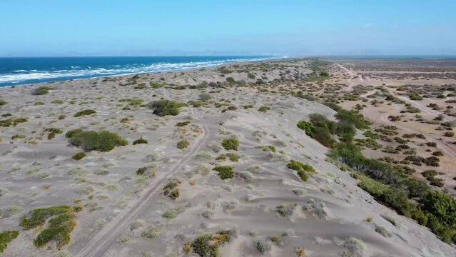 Aerial view of Tecolote Beach (Playa El Tecolote) with clear turquoise waters of Gulf of California - landscape panorama of Latin America from above
