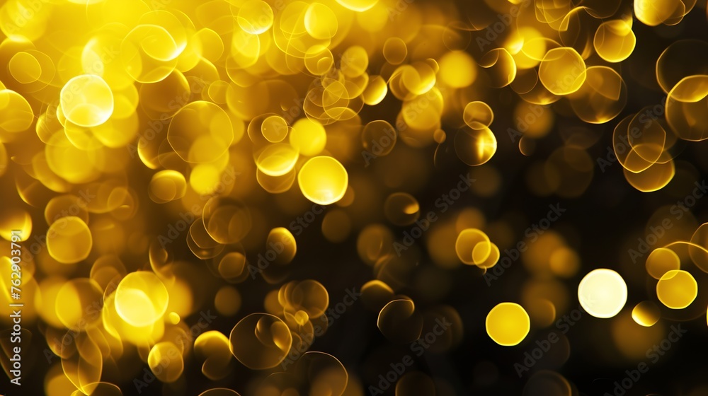Poster yellow abstract bokeh made from christmas lights on black isolated background holiday concept blur b