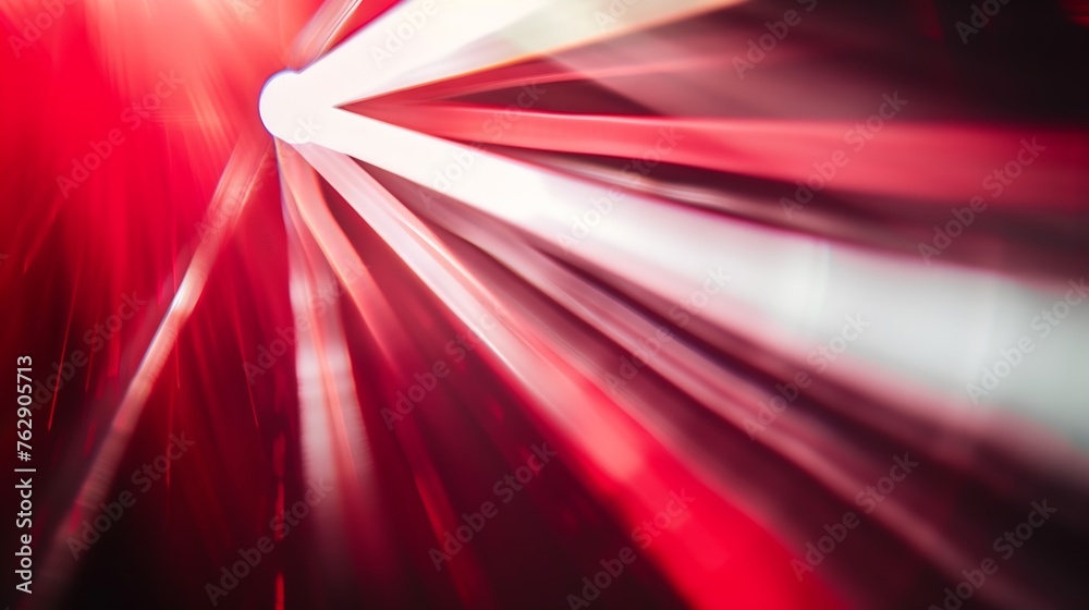 Fototapete abstract background with diffused tracks of bright red and white rays against dark blurred surface :