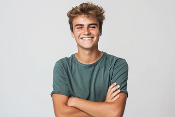 Portrait of handsome smiling young man with folded arms isolated white background. - obrazy, fototapety, plakaty