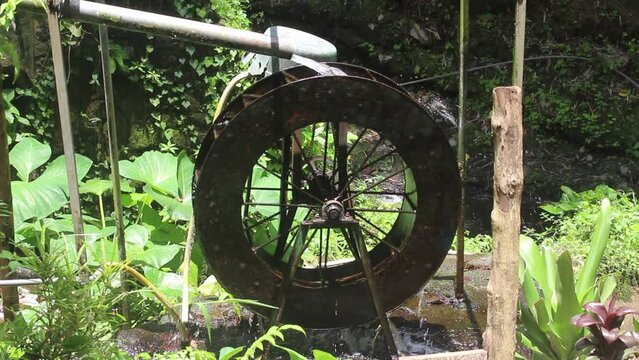 A waterwheel or turbine used to drive a generator in a hydroelectric power plant.