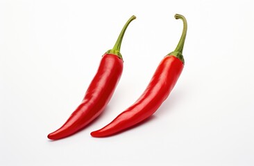 Chili is a red vegetable that is spicy.