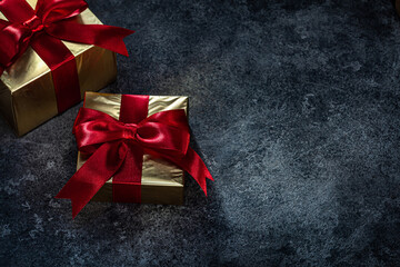 Golden Gift Boxes  On Dark Background