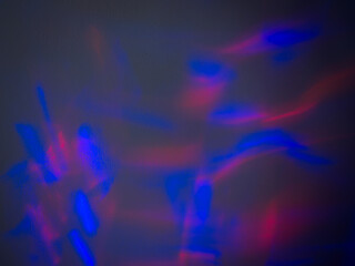 Light reflections at night on the wall in the dark for a party.     