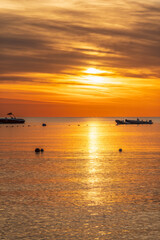 Fototapeta na wymiar Beautiful red and orange sunrise over the sea.