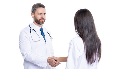 Obraz premium doctor and nurse colleague handshaking in hospital provide medicine service and healthcare teamwork isolated on white