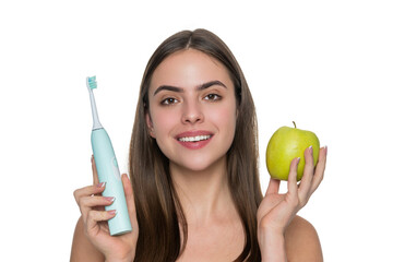 Woman toothy smile isolated on white. Woman brushing teeth with electric toothbrush. Girl brushing...