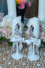 champagne glasses decorated for bridal couple