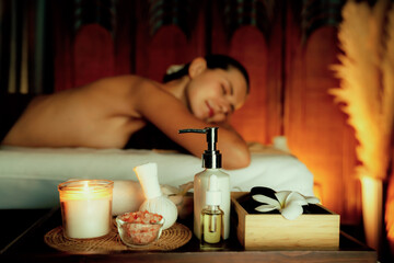 Aromatherapy massage ambiance or spa salon composition setup with focus decor candles and spa...