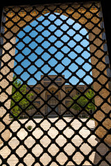 View through the window to the ancient madrasah, Bukhara, Uzbekistan.