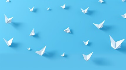 Obraz premium Origami figures on a blue background. Abstract figures made of paper.