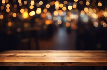 Empty wooden table top with blurred background of bar or cafe at night for product display montage, banner design.