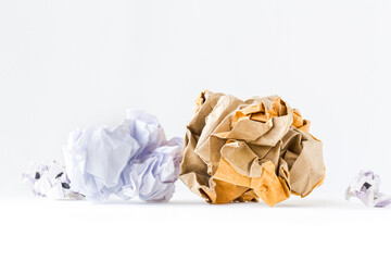 crumpled paper on white background. Waste paper recycling concept.