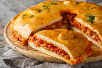 Empanada Gallega Traditional pie stuffed with tuna or meat and vegetables typical from Galicia,...