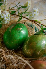 Easter decoration with green  eggs and flowers